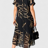 Vestido Negro Allegra con Estampado Abstracto en Dorado y Escote en V