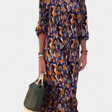 Vestido Teodora Retro con Escote en V y Mangas Abullonadas