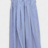 Camisa de Cuello Alto a Rayas Ippolita y Falda de Traje Plisada