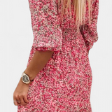 Vestido Floral Benicia con Mangas Abullonadas y Bajo Juguetón