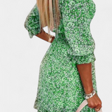 Vestido Floral Benicia con Mangas Abullonadas y Bajo Juguetón