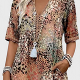 Vestido Perla Boho con Estampado Floral y Detalles de Crochet