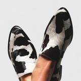 Elegantes mocasines Macarena con tacón bajo y estampado animal