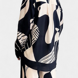 Conjunto de Pierna Ancha Basilisa con Estampado de Graffiti