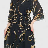 Vestido Midi Ame con Cinturón y Corte Versátil
