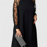Vestido Negro Bellezza con Mangas de Malla y Corte Suelto