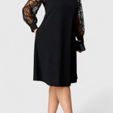 Vestido Negro Bellezza con Mangas de Malla y Corte Suelto