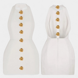 Vestido Mini Yvonne con Cuello Halter y Espalda Abierta con Detalle Floral