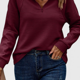 Jersey Helene con escote en V, cremallera y mangas largas