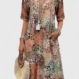 Vestido Perla Boho con Estampado Floral y Detalles de Crochet