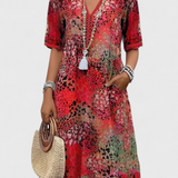 Vestido Perla Boho con Estampado Floral y Detalles de Crochet