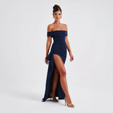 Vestido largo de mujer con hombros al descubierto y abertura