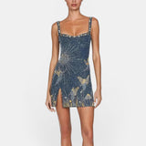 Top corto azul con motivos celestiales dorados para la noche