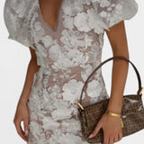 Top floral transparente con mangas abullonadas para la noche