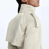 Trench-coat mujer con cuello alto y cinturón anudado