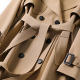 Abrigo largo estilo gabardina para mujer con cinturón y solapas