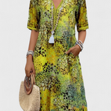 Vestido Perla Boho con Estampado Floral y Detalles de Crochet